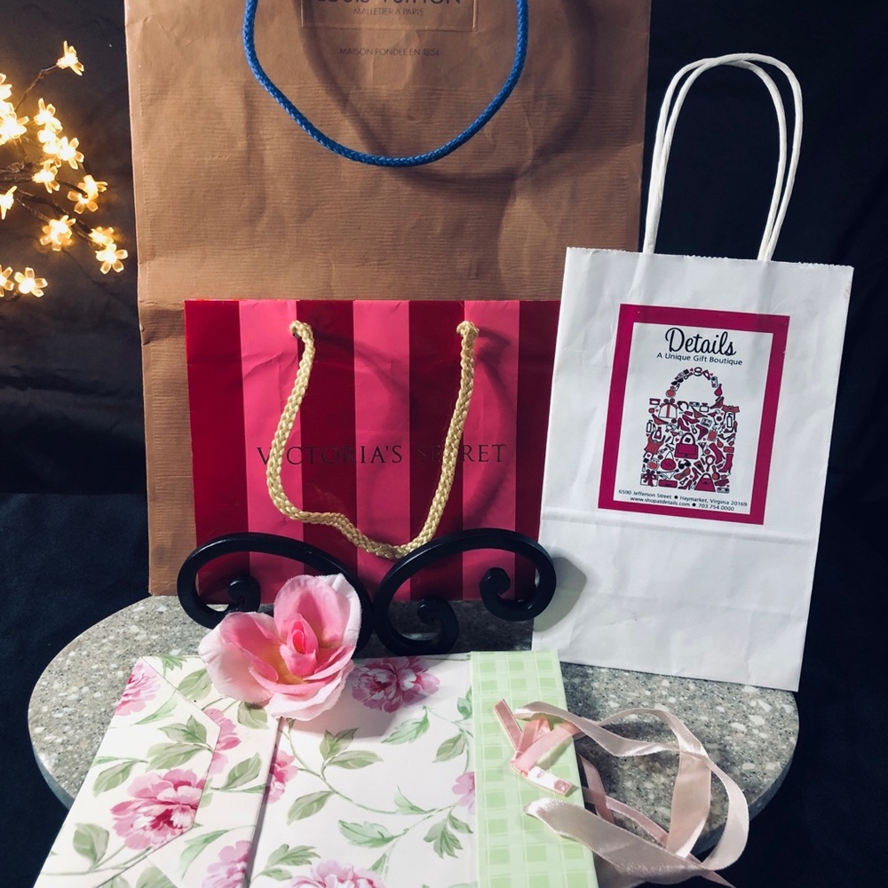 Lot of four elegant bags. Louis Vuitton and Victoria secret.